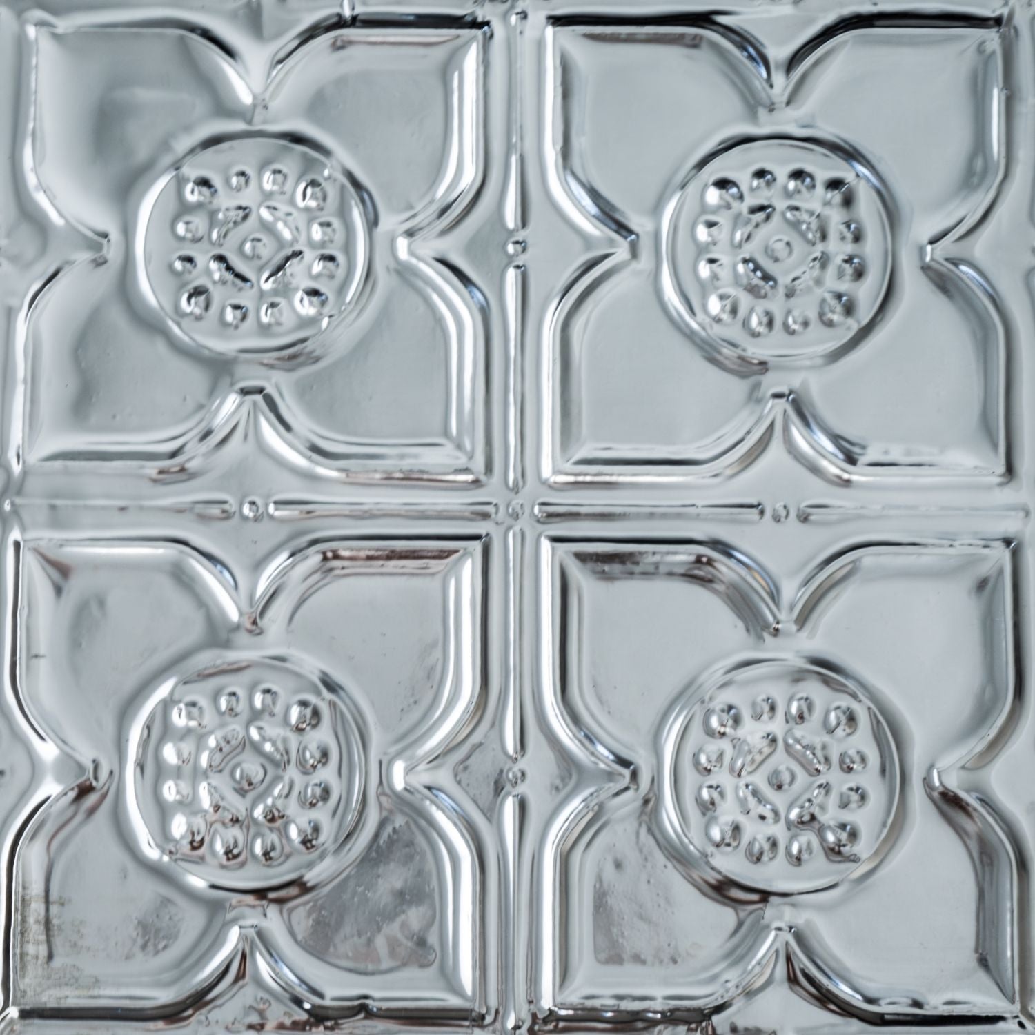 Shanko Decorative metal ceiling tile with a geometric pattern.